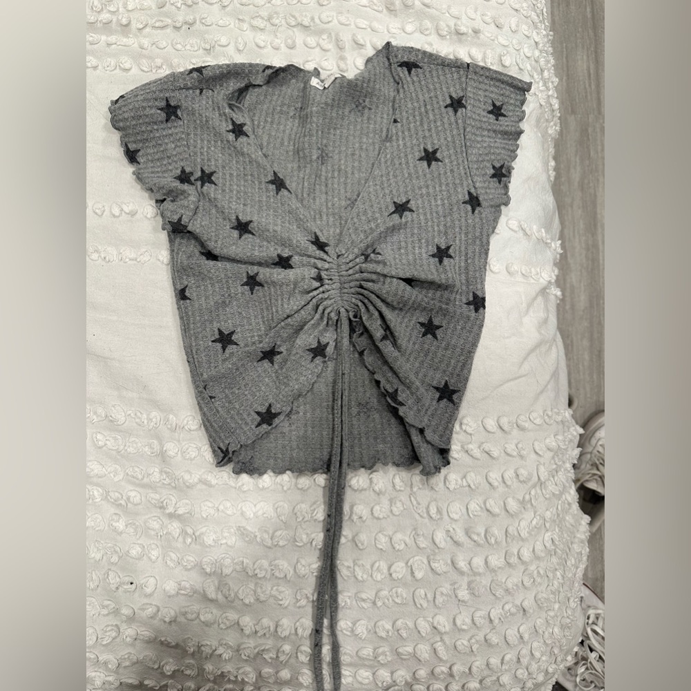 Cute cropped cinched star v-neck shirt